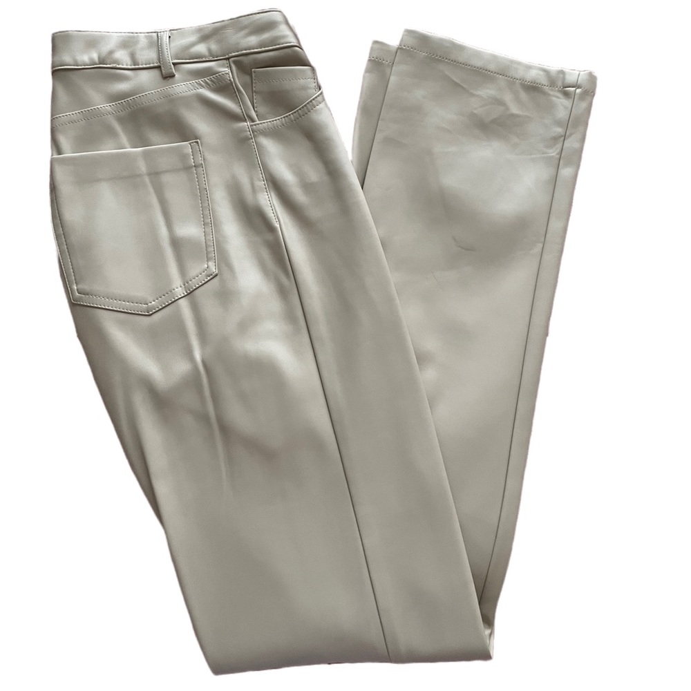 Cream colored Zara leather pants with slits at pant leg.